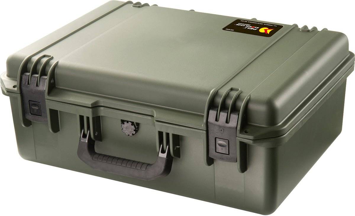 The olive green iM2600 Storm Case features black latches, a handle, and a small top right label—this crushproof PELI case is built to protect your valuables.