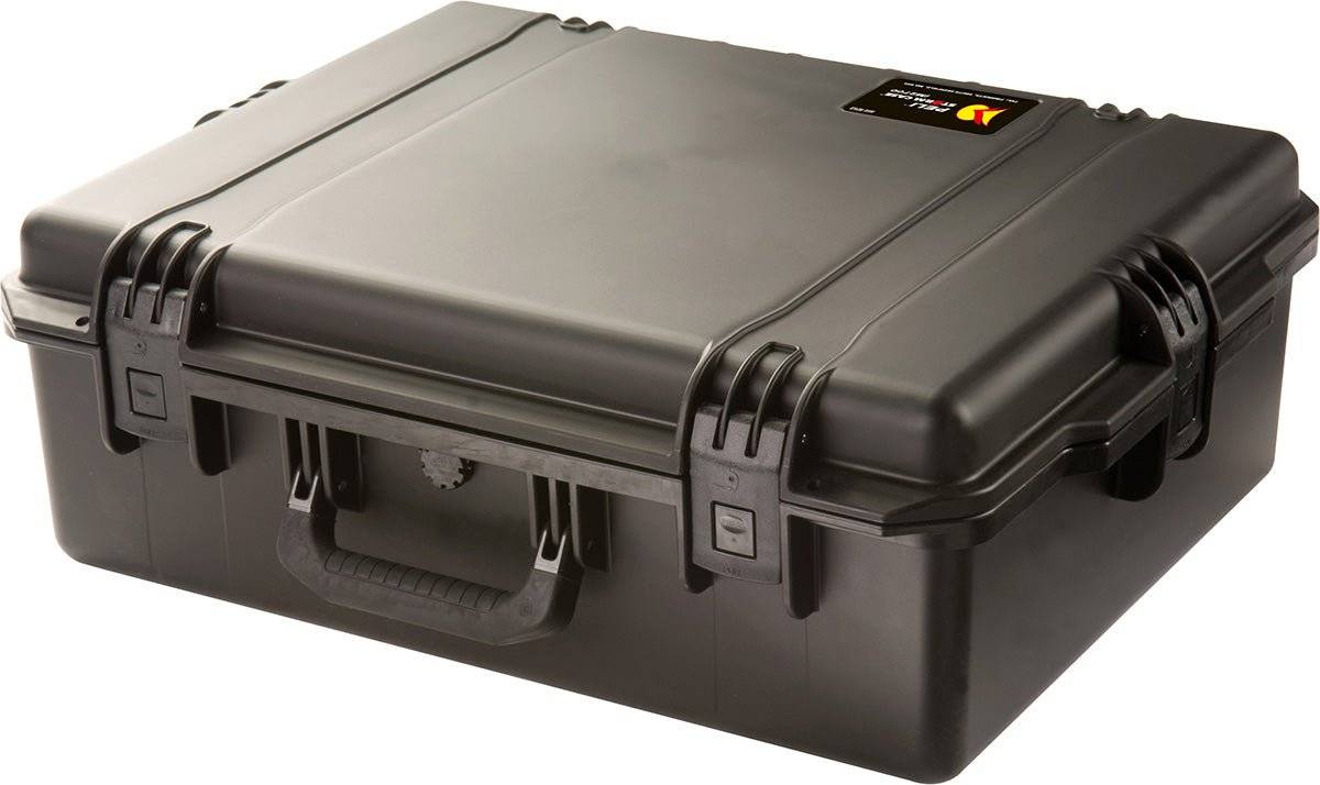 The iM2700 Storm Case is a closed, black crushproof case with latches and a handle, designed by PELI for secure storage and transport of sensitive equipment.