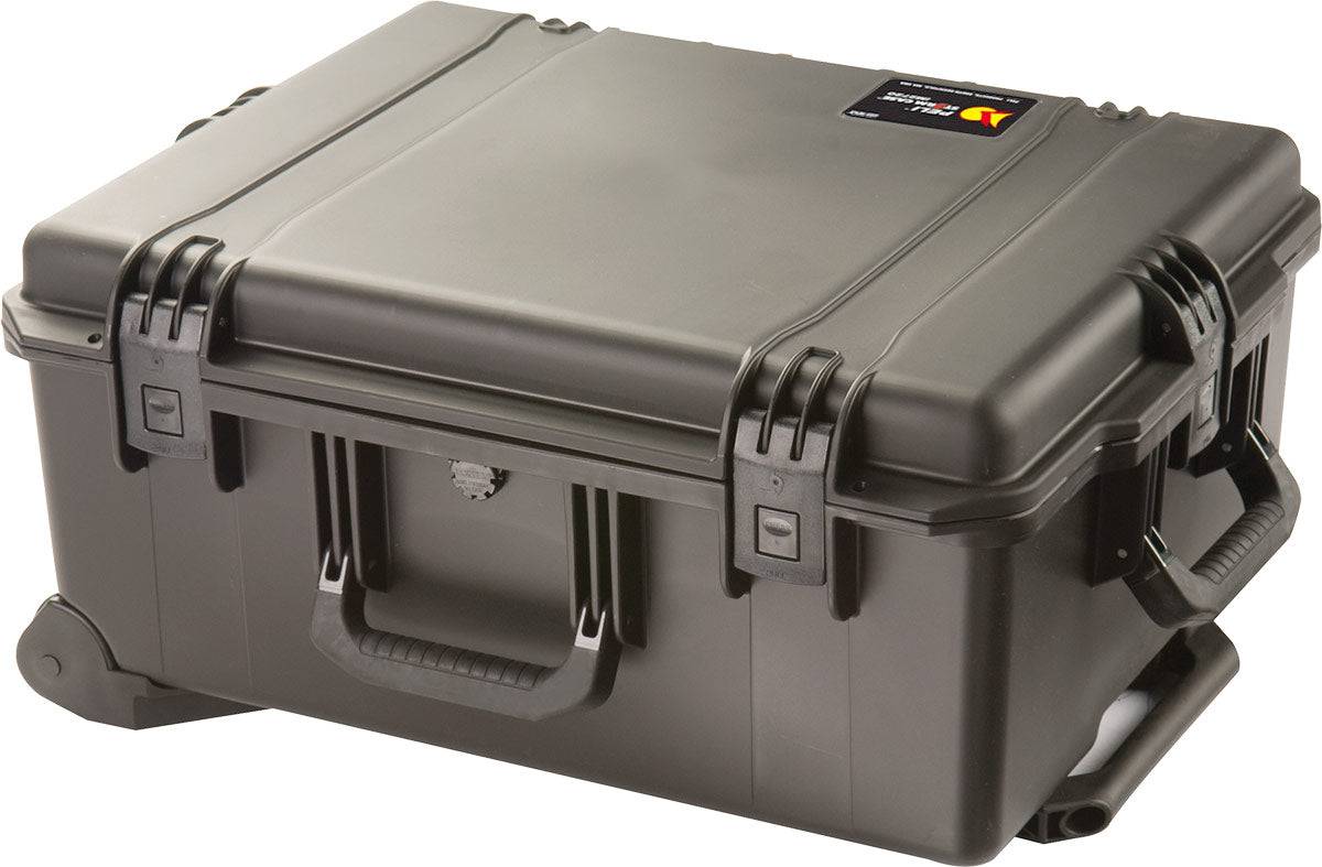 A hard, black iM2720 Storm Travel Case with custom CNC foam, a secure Press and Pull latch, handle, and small label on the top corner.