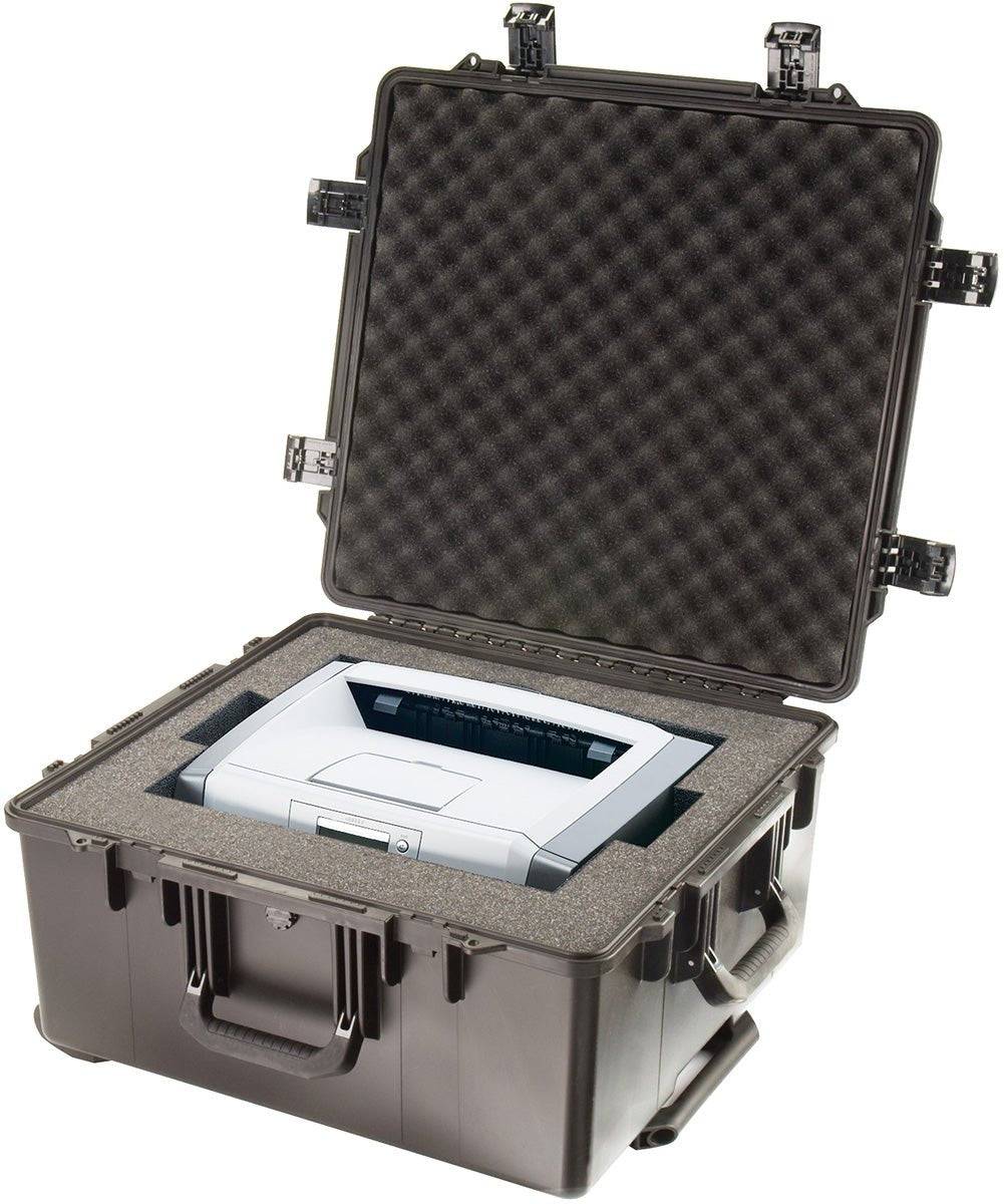 The iM2875 Storm Travel Case with custom CNC foam and Press and Pull latch securely holds a compact printer inside.