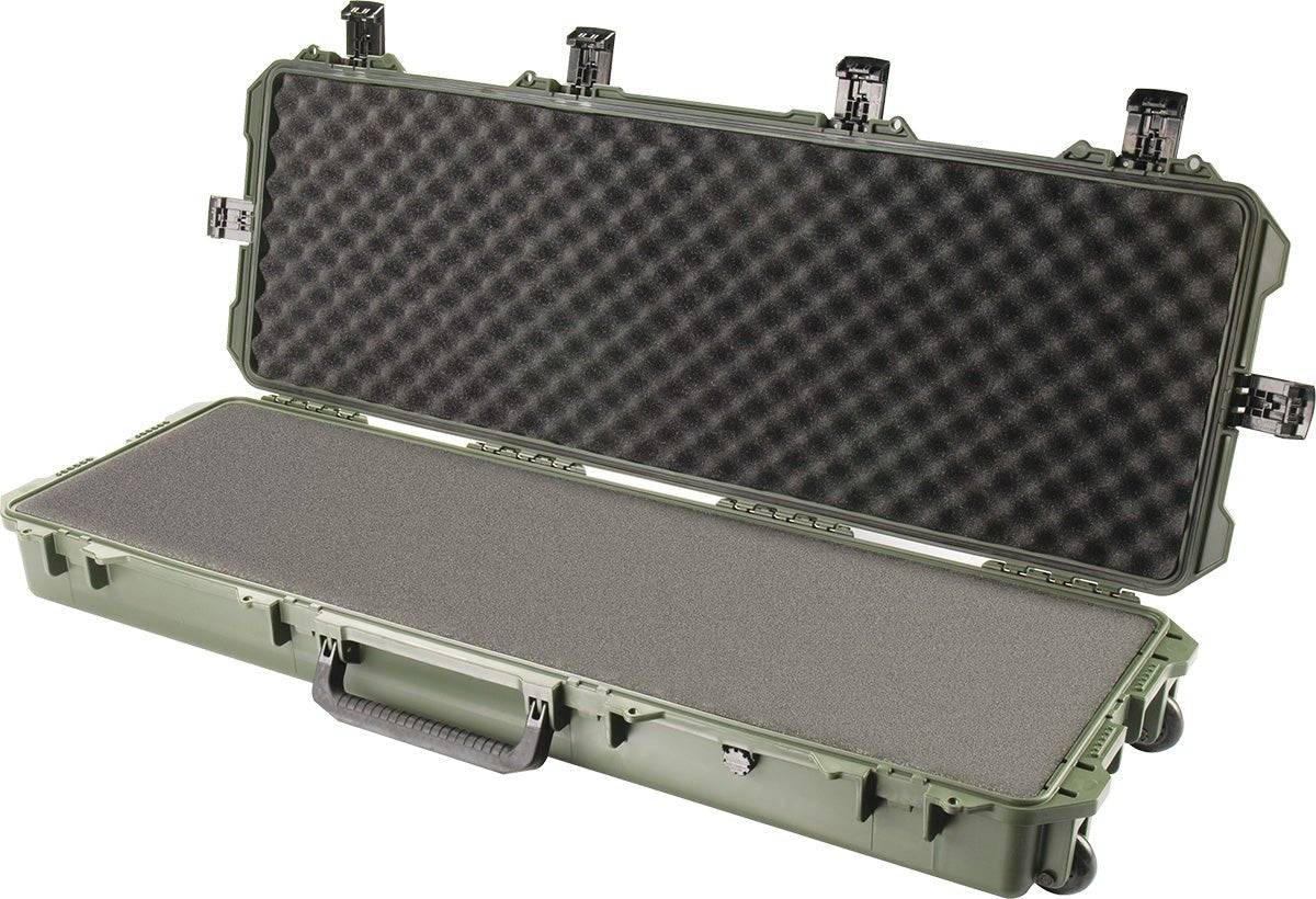 The iM3200 Storm Long Case is a large, olive green case made from durable HPX Resin, shown open with foam padding inside, Press and Pull latches, and a carrying handle.