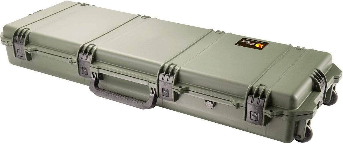 The iM3200 Storm Long Case is a large, hard-shell olive green case with Press and Pull latches, handle, wheels, and a small ID label on the top right. Made from tough HPX Resin for outstanding durability.