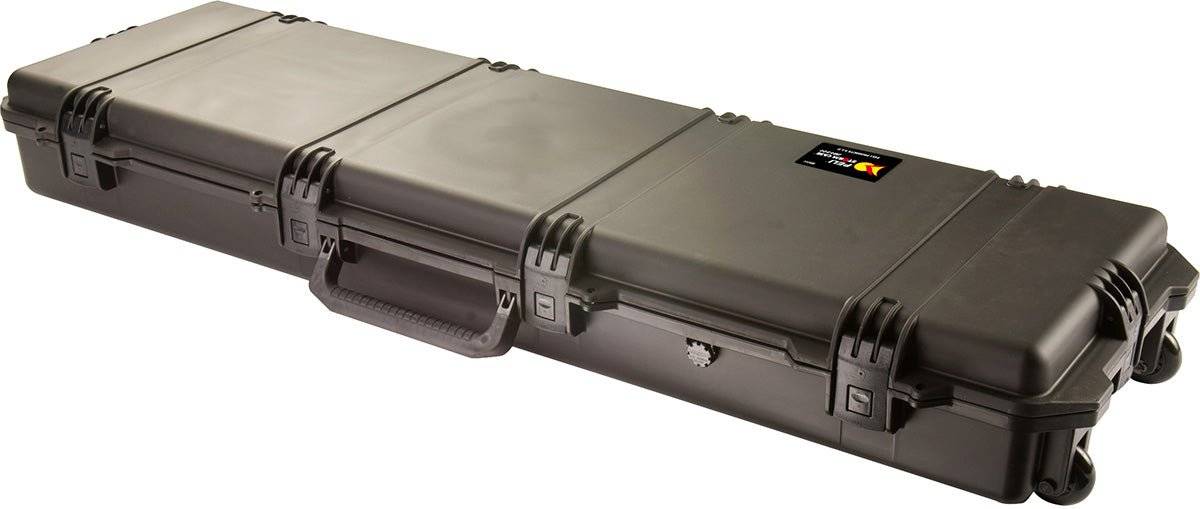 The iM3300 Storm Long Case is a large, black case made from rugged HPX Resin, with reinforced corners, three Press and Pull latches, a side handle, and a small label on top.