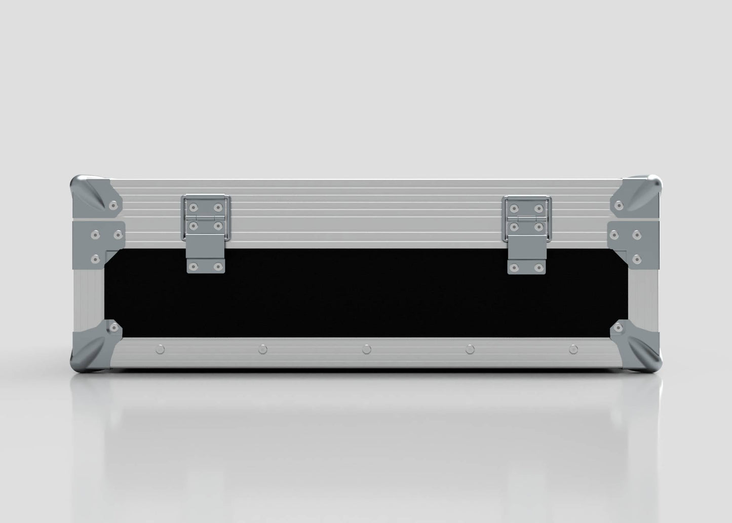 A closed, rectangular Microphone Case in silver with reinforced metal corners and two latches sits on a reflective surface; its external dimensions are 577 x 526 x 192 mm.