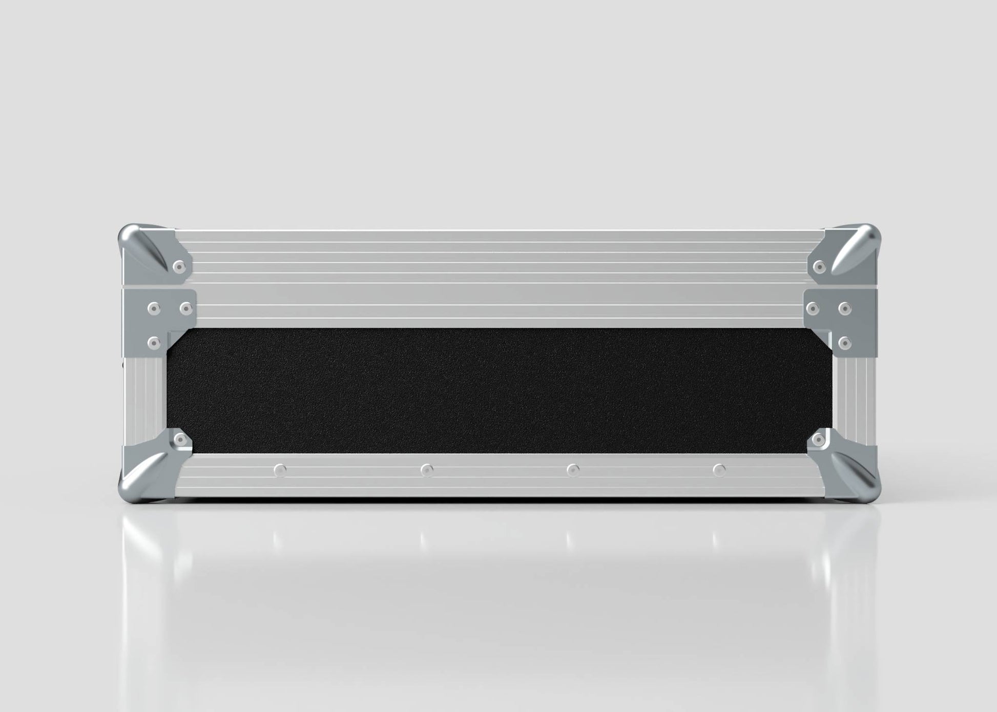 A sleek rectangular Microphone Case in metal and black, with reinforced silver corners and measuring 577 x 526 x 192 mm, is placed on a reflective white surface against a plain background.