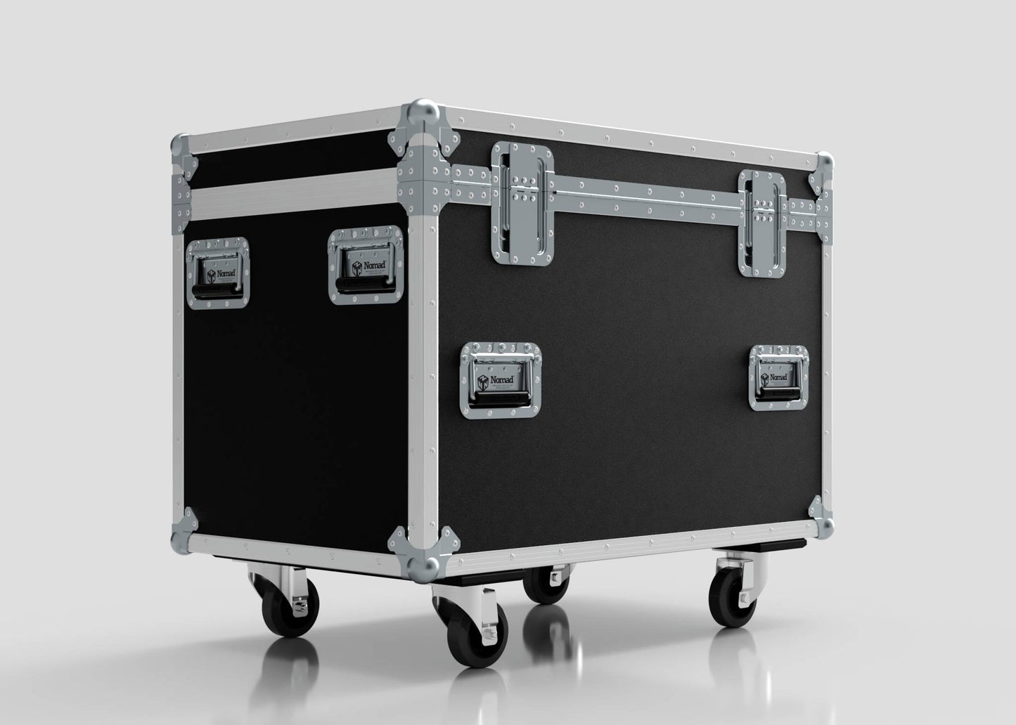 The MUT Trunk Case is a large black multi-utility flight case with metal edges, secure latches, wheels for easy mobility, and an adjustable divider system, shown against a plain light background.