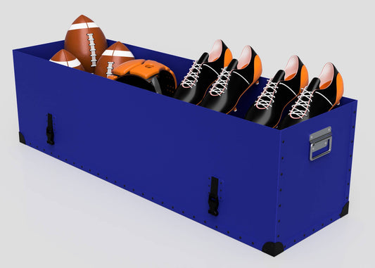 The Rugby Storage Poly Case (Large) in blue stores three footballs, three pairs of black and orange cleats, and an orange helmet—ideal for protecting your rugby gear.