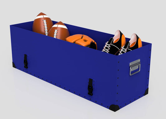 The Rugby Storage Poly Case (Medium) features a blue polyethylene build, zinc drop handle, and holds two footballs, an orange helmet, plus black and orange cleats.