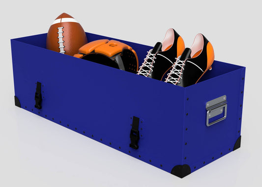 The Rugby Storage Poly Case (Small), made of blue polyethylene with a zinc drop handle, holds a football, helmet, and orange-black cleats.
