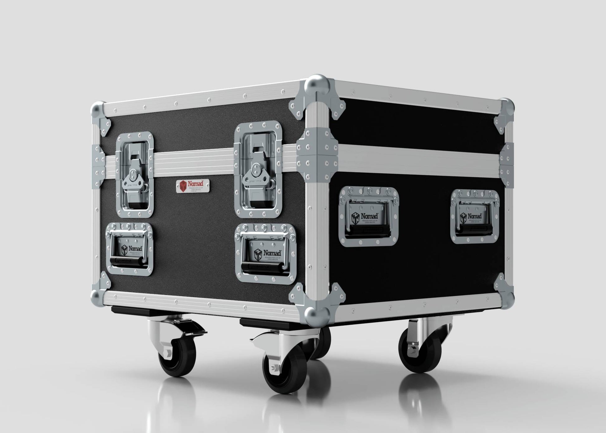 The Single 1 Ton EXE Motor Chain Hoist Case is a black and silver rolling flight case with four metal latches, reinforced corners, and caster wheels. Its external dimensions are 696 x 607 x 580 mm.