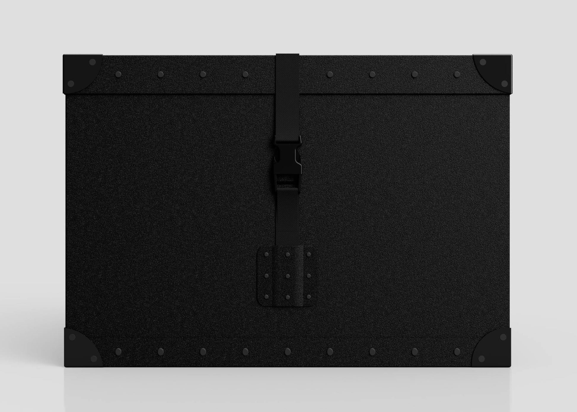 The Standard Cube Storage Box - Medium is a black, rectangular polyethylene box with reinforced corners, metal rivets on the edges, and a central front latch.