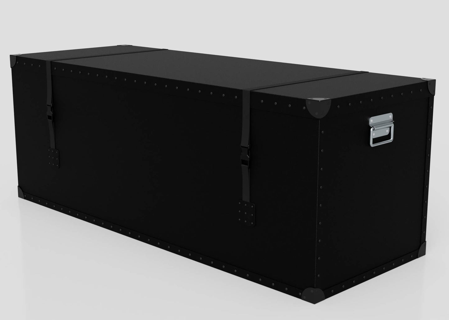 The Standard Long Storage Box - Extra Large is a large, rectangular black trunk with metal corner reinforcements, zinc drop handles, and webbing side release buckles, shown on a plain light background.