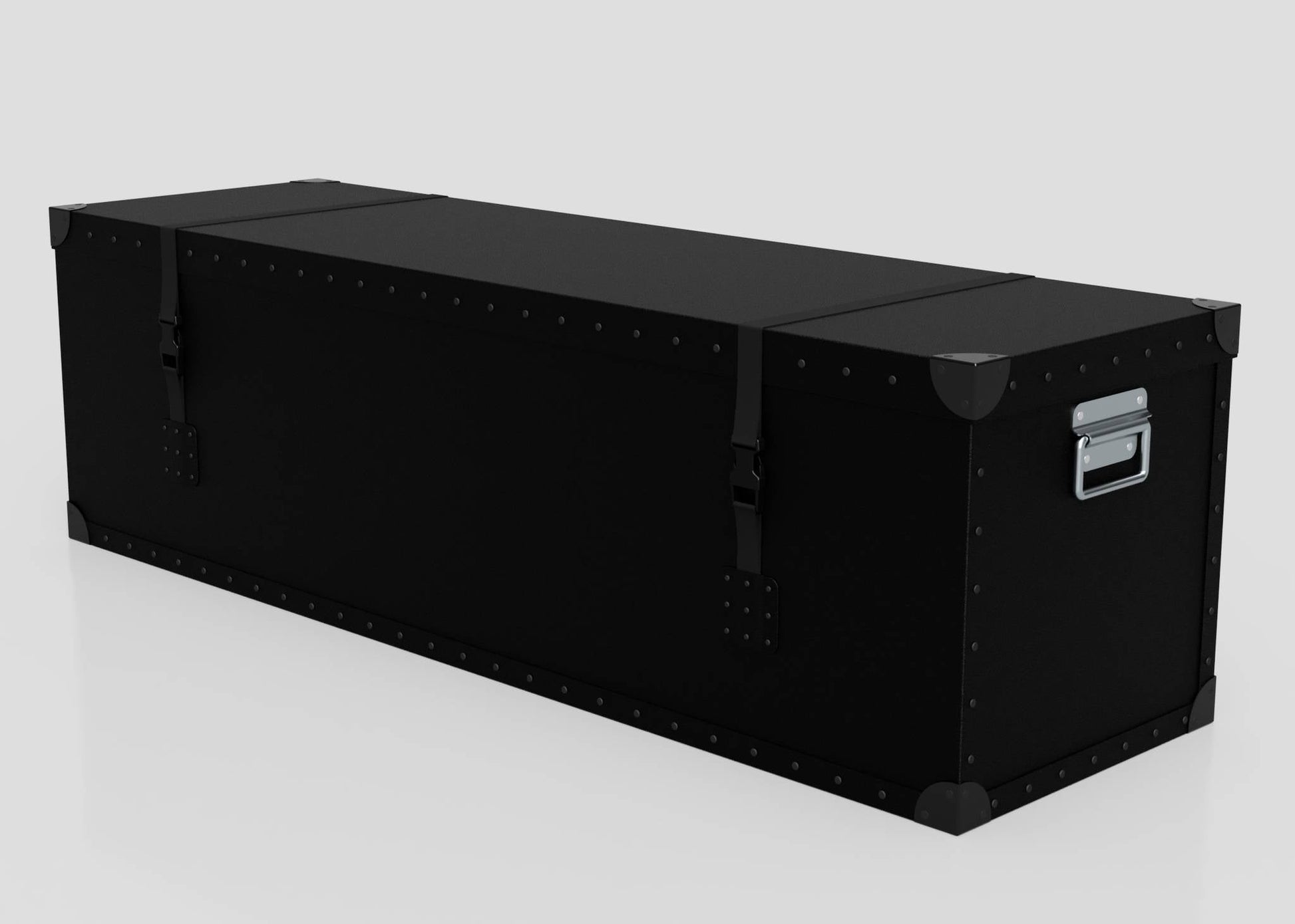 The Standard Long Storage Box - Large is a rectangular black trunk with metal corner protectors, zinc drop handle, and two webbing buckle straps, shown against a plain white background.