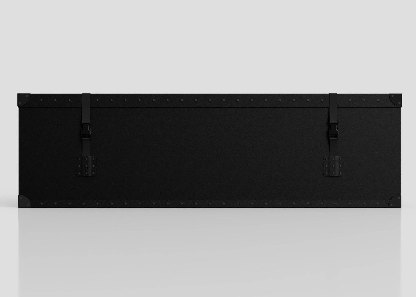 The Standard Long Storage Box - Large is a rectangular black case with metal corner protectors, rivets, two latch straps, and a sturdy zinc drop handle, shown against a plain light background.