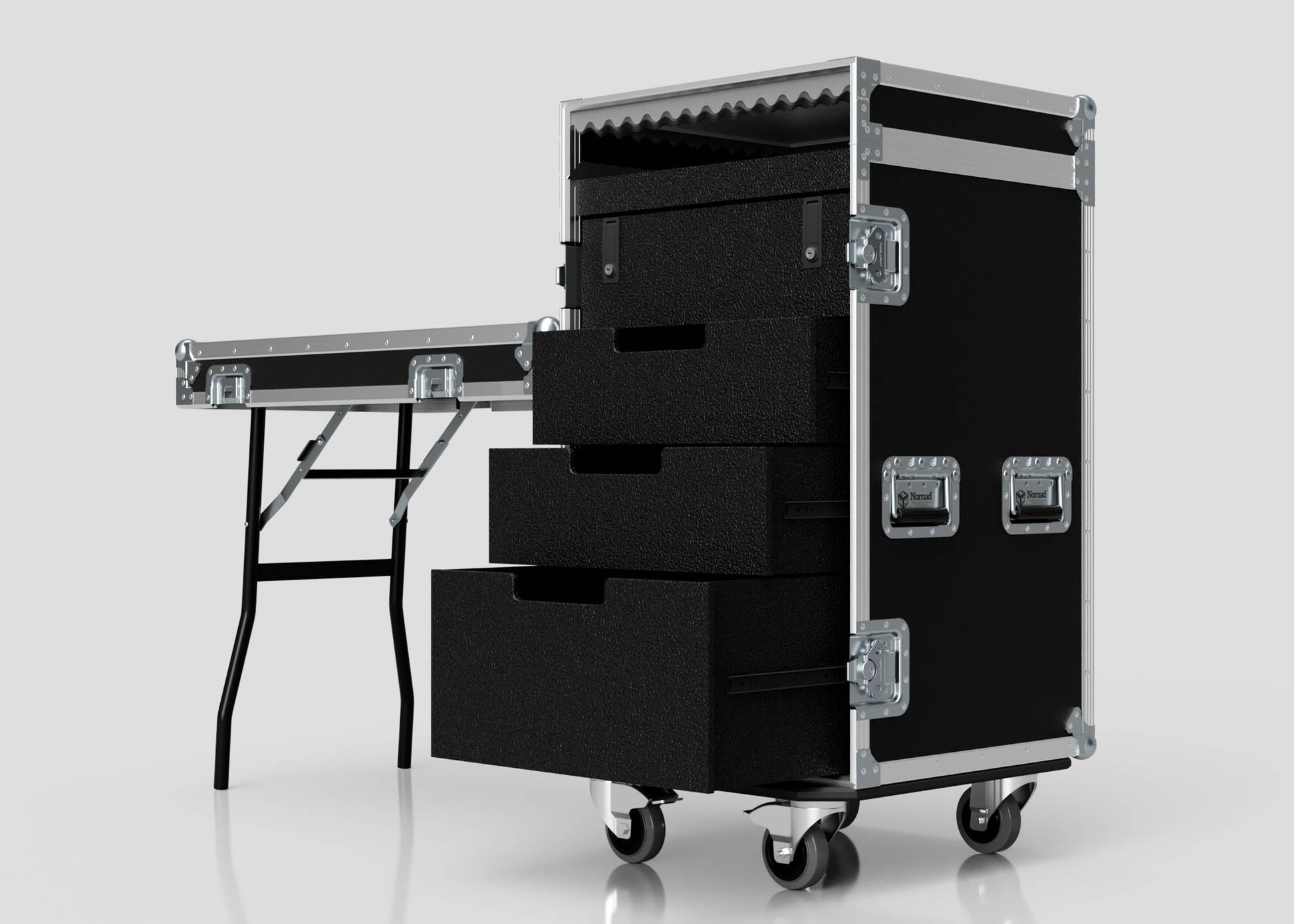 The TM Whiteboard Drawer Case, a black rolling equipment case with metal edges and external dimensions for easy transport, is open to show three foam-lined drawers and is placed beside a trestle table on a white background.