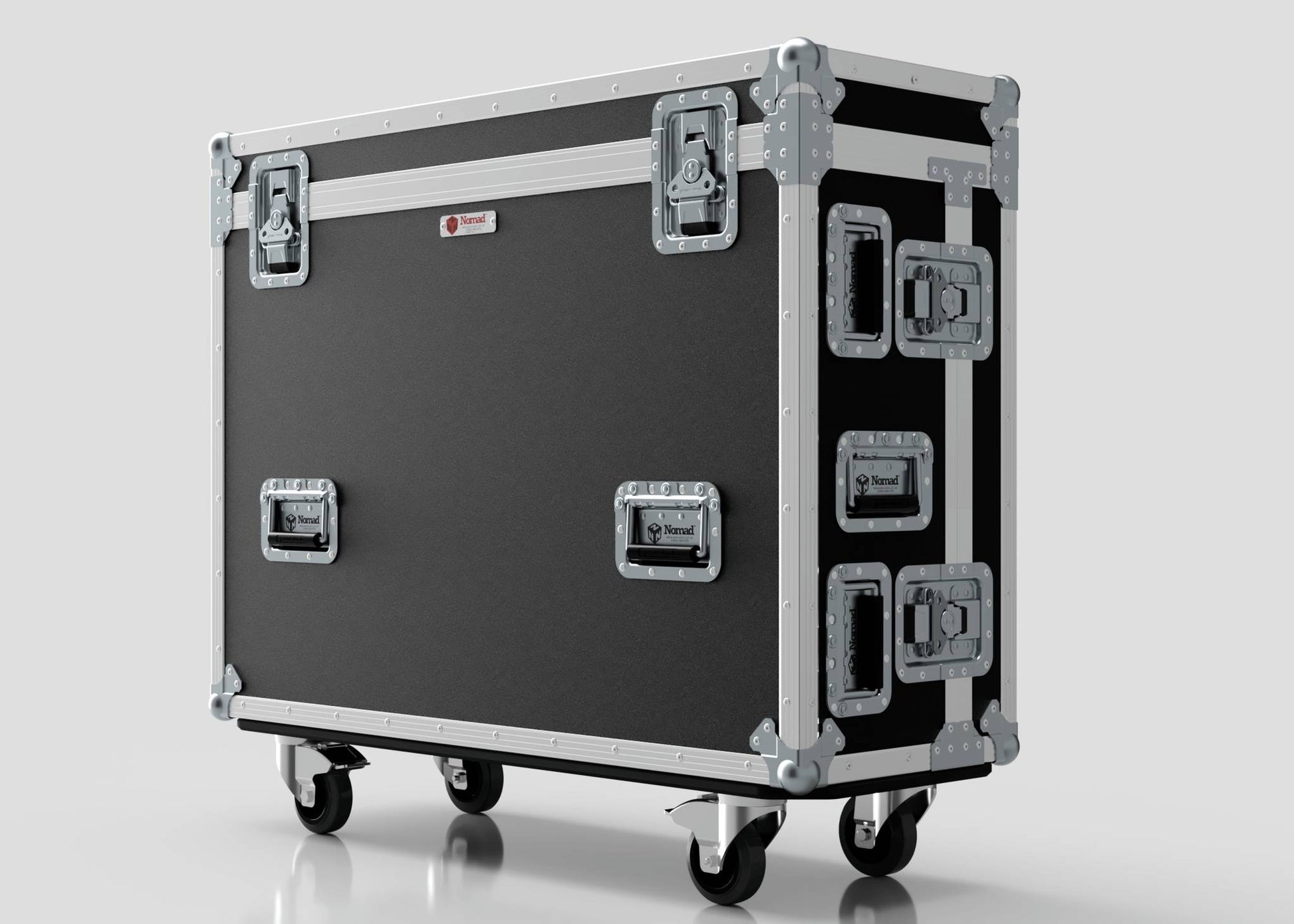 The Yamaha DM7-EX Compact Case, finished in black and silver with metal reinforcements, latches, handles, and four caster wheels, is perfect for Nomad professionals and is shown on a light background.