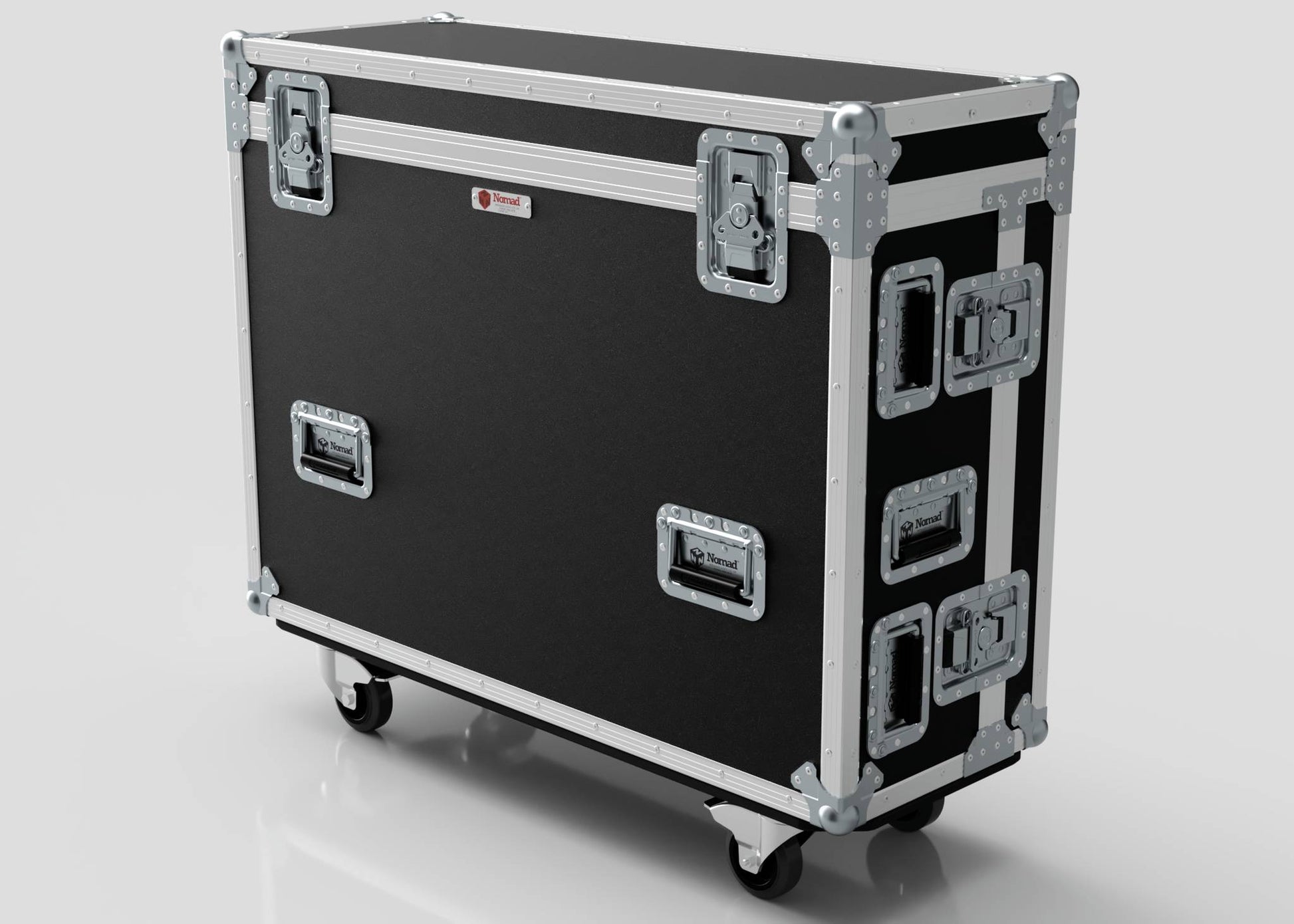 The Yamaha DM7-EX Compact Case is a large black flight case with metal edges, reinforced corners, multiple latches, and four caster wheels, designed for secure equipment transport.