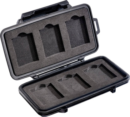 The 0965 PELI Micro™ Memory Card Case is a durable, hard plastic case with foam inserts and four rectangular slots to securely store memory cards or batteries while protecting them from shocks.