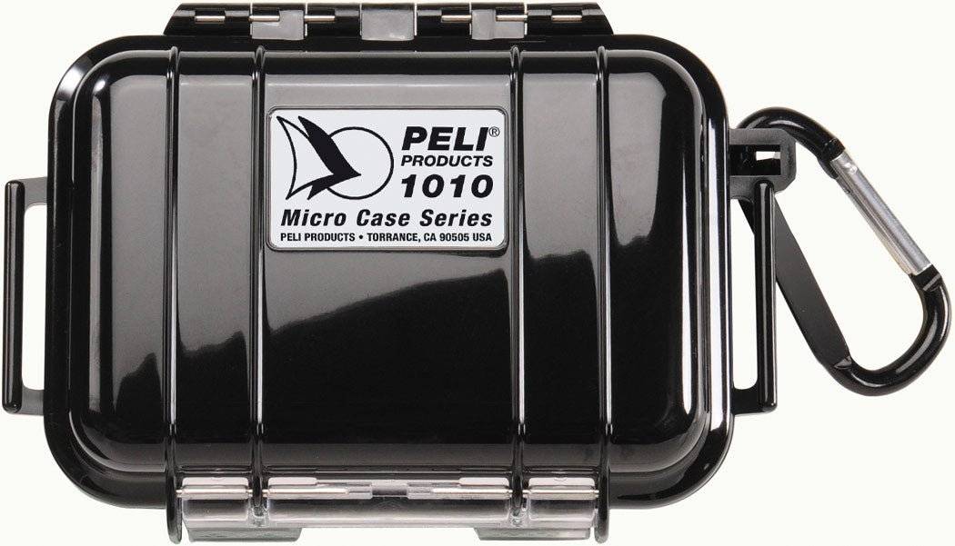 A closed black 1010 PELI Micro™ Case with a label on top and an attached carabiner on the right, designed to be watertight and crushproof for secure protection.
