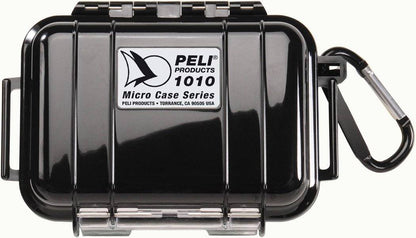 A closed black 1010 PELI Micro™ Case with a label on top and an attached carabiner on the right, designed to be watertight and crushproof for secure protection.
