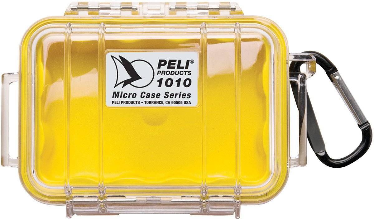 A 1010 PELI Micro™ Case in yellow and clear, viewed from the top with a black carabiner. This crushproof case offers reliable protection for your valuables.