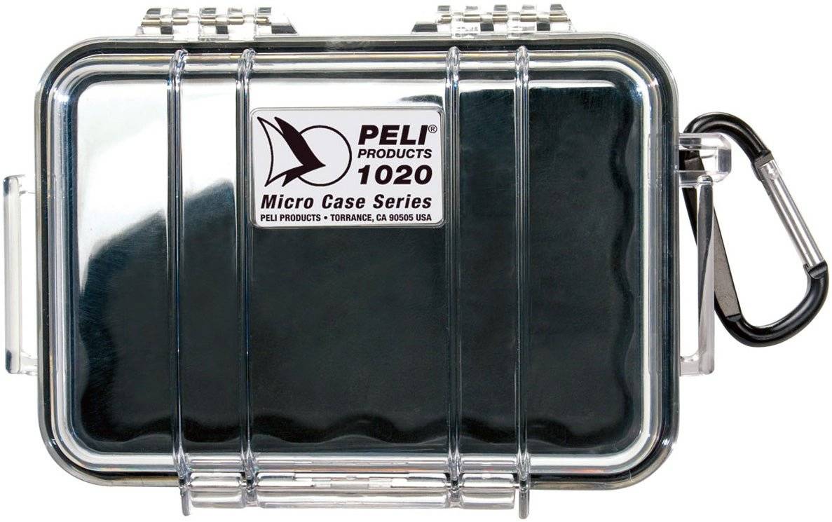The 1020 PELI Micro™ Case features a clear lid, black base, label, and attached carabiner. This crushproof case is watertight and dustproof, ensuring reliable protection for your valuables wherever you go.