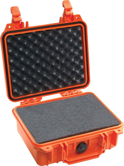 The open orange 1200 Protector Case features foam padding in the lid and base, offering robust protection for equipment during transport.