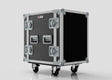 The 12U Standard Rack Case, made of black birch plywood with metal reinforcements, handles, and four caster wheels, offers sturdy equipment storage and is shown on a plain light background.