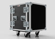 The 13U Foam Shock Mounted 19" Rack Case is a black, rectangular flight case made from European birch plywood with metal-reinforced edges, four latch locks for security, and four caster wheels, shown against a plain background.