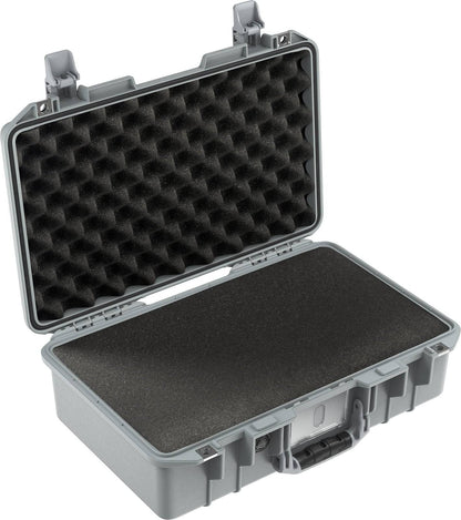 The 1485 Air Case is a gray, lightweight hard case featuring foam padding, a hinged lid, and secure latches—perfect for protection and portability.