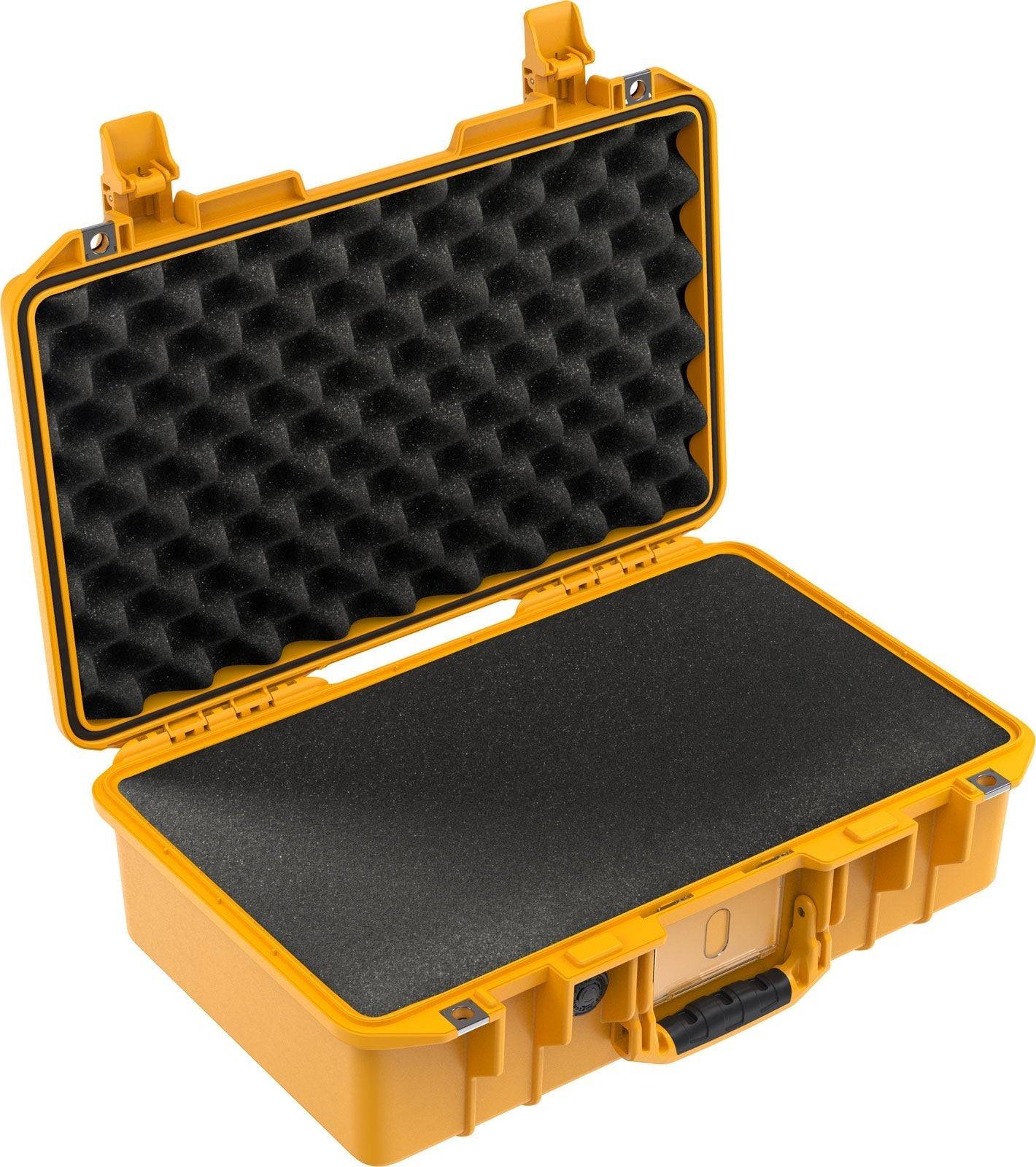 The 1485 Air Case is a yellow, lightweight hard case with an open lid and black egg-crate foam inside—perfect as a waterproof protective case for your valuables.
