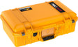 A closed, bright yellow 1485 Air Case with black latches, handle, and a lid label is displayed against a white background.
