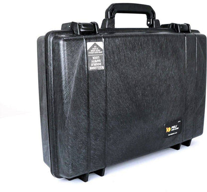 A hard-shell black PELI 1490 Protector Laptop Case with a handle, reinforced corners, and a small rectangular label stands on a white surface—a durable, rugged equipment case.