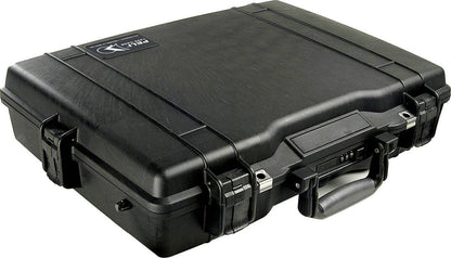 A closed black PELI 1495 Protector Laptop Case with a handle and secure latches sits on a plain surface. This crushproof case offers maximum protection.