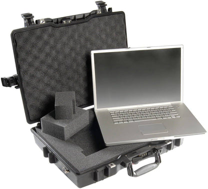 A silver laptop sits atop an open 1495 Protector Laptop Case, which features custom foam padding inside this crushproof case for superior protection.