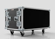 The 14U Double Bay Rack Case, a large black flight case with metal edges, reinforced corners, handles, latches, and four caster wheels, is pictured on a plain white background.