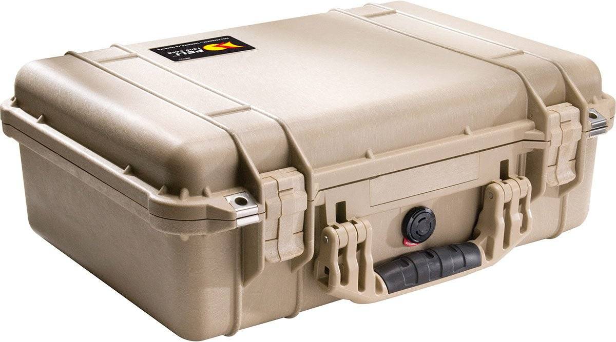 The 1500EU Protector Case is a tan, hard-shell PELI case with secure latches, carry handle, and a small top-left logo label—ideal as a watertight solution for safeguarding your equipment.