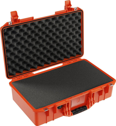 The 1525 Air Case is an open, orange, lightweight polymer case with black egg-crate foam in the lid and flat foam in the base, ideal for secure storage.