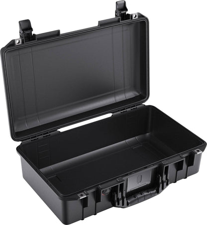 The black 1525 Air Case is shown open, displaying its empty interior with reinforced sides and a front handle. This lightweight polymer case from PELI offers reliable protection for your gear.
