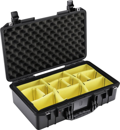 The 1525 Air Case, shown in black with the lid open, features egg crate foam on top and yellow padded dividers inside. Its lightweight polymer build offers protective, organized storage with added convenience.