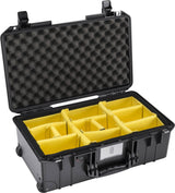 The 1535 Air Case, shown in black with its lid open, features foam padding and yellow adjustable dividers for organized storage; this lightweight protective case keeps your gear secure.