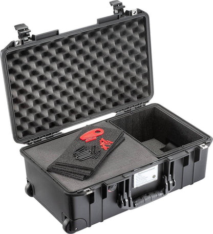 The 1535 Air Case is a lightweight black protective case with a hard shell, foam padding, and an open lid, designed to hold assorted small tools and materials.