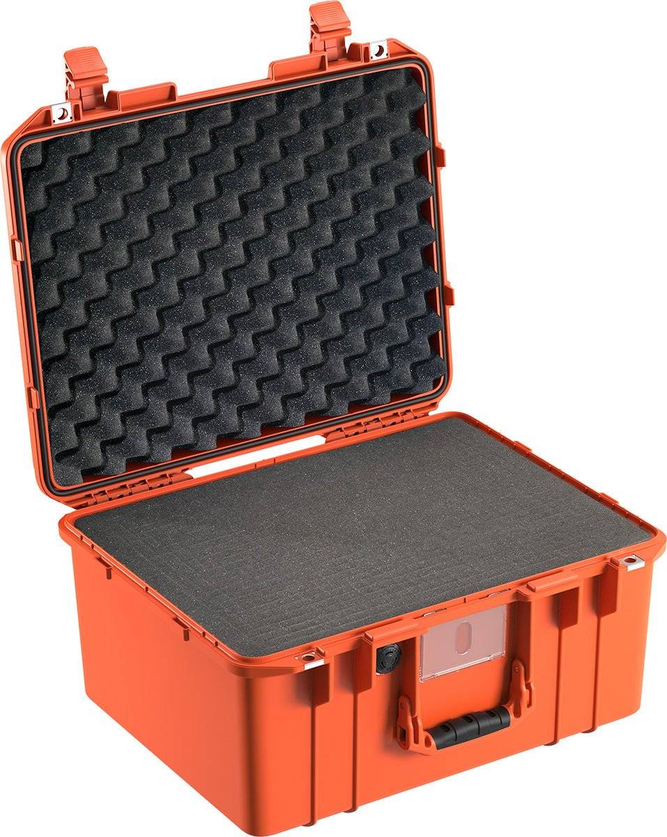 The 1557 Air Case is an open, orange, lightweight polymer case with foam padding on the lid and base, designed for protective storage and transport.