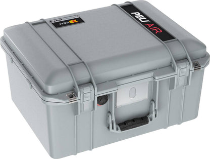 The 1557 Air Case is a gray lightweight polymer PELI AIR case with a handle, secure latches, PELI AIR branding on the lid, and waterproof protection for superior durability.