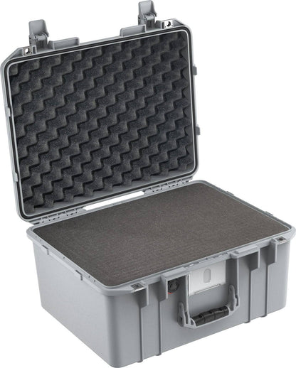 The 1557 Air Case is a gray, lightweight polymer case with an open lid, showing foam padding inside the lid and base—ideal for keeping your gear protected.