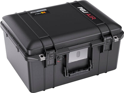 A black 1557 Air Case, made of lightweight polymer, featuring a handle, secure latches, and a front label slot; shown closed and angled.