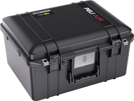 A black 1557 Air Case, made of lightweight polymer, featuring a handle, secure latches, and a front label slot; shown closed and angled.