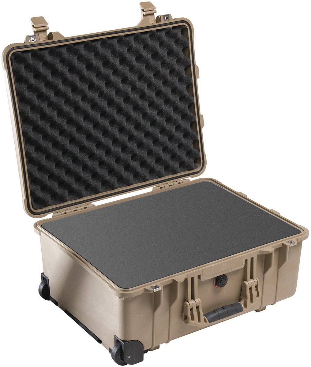The tan PELI 1560 Protector Case features a hard shell, open lid showing foam padding, and wheels for easy transport. This crushproof case ensures reliable gear protection in any situation.