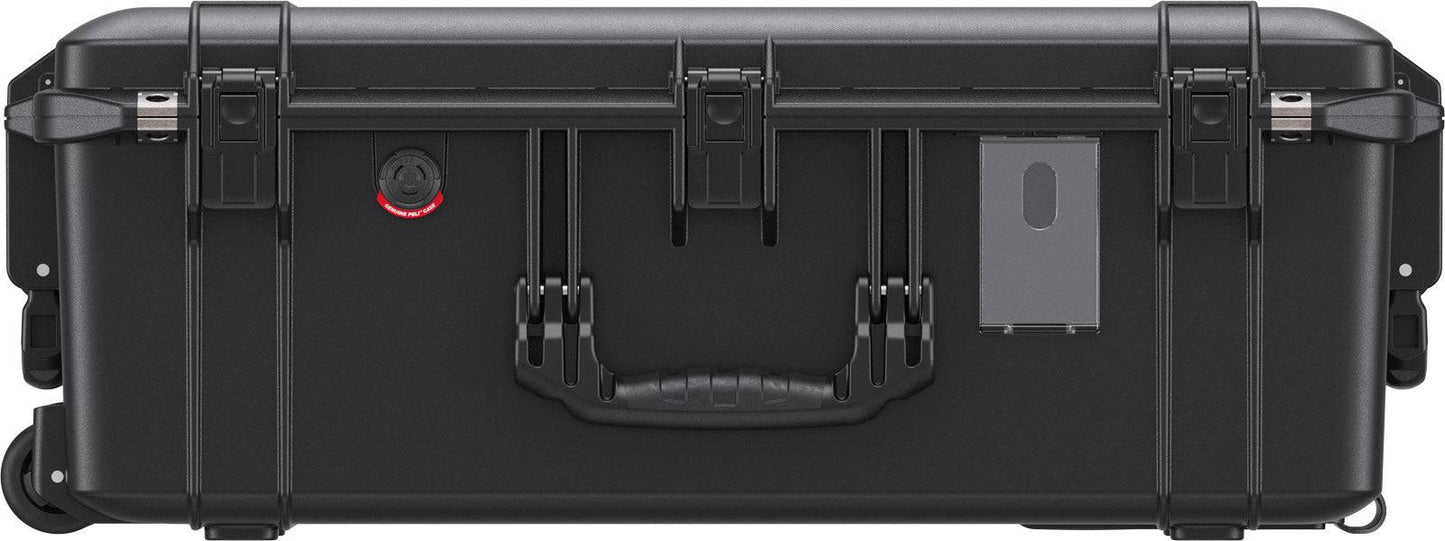 The 1595 Air Case is a black hard-shell waterproof case with latches, wheels, carrying handle, and a clear label holder—perfect for airline check-in.