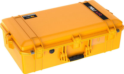 The yellow 1605 Air Case is a closed, lightweight Peli Air travel case with black handle and latches, designed for durable, protective storage and transport.